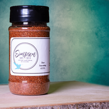 Load image into Gallery viewer, A bottle of Taco Seasoning from the Simpson Spice Shop
